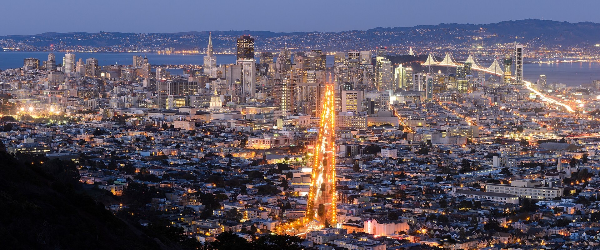 Two-segment panorama of the San Francisco skyline, as seen from Twin Peaks.